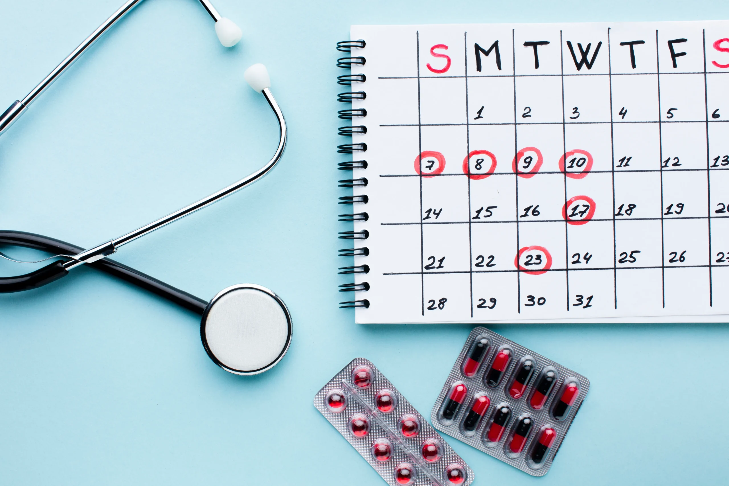 Calendar with a stethoscope and pills